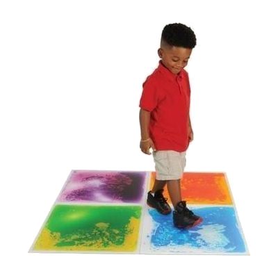 Boy Playing with Cosmic Liquid Tiles
