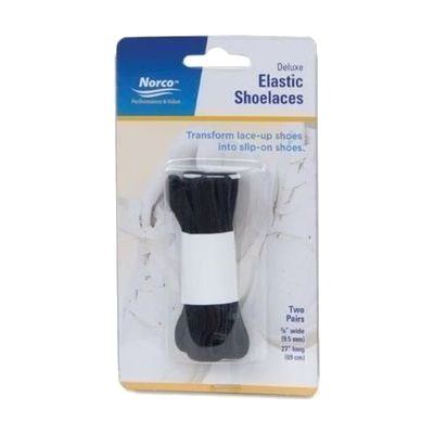 Coiled elastic shoelaces in a neutral color, stretchy cord material with small metal or plastic aglets at each end