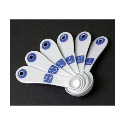 Set of six white plastic measuring spoons with wide flat handles and large printed measurement labels, nested together