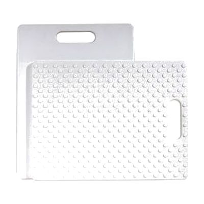 Two flat rectangular cutting boards side by side, one white and one black, approximately 11 by 14 inches with rubber feet on 