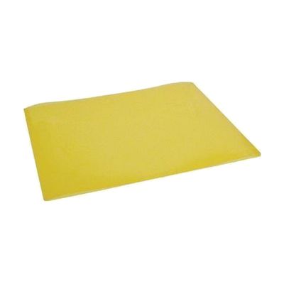Flat transparent yellow plastic sheet, 8.5 by 11 inches, shown over printed text