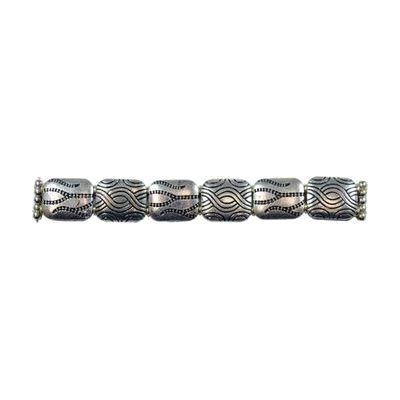 image: close up of metal beaded band