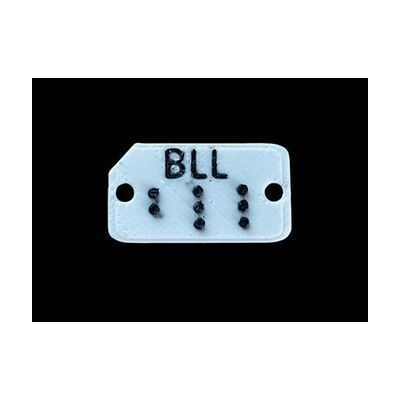 Image: brailled clothing tags