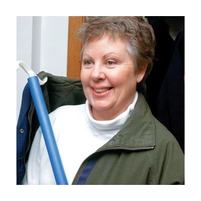 Long plastic-coated dressing stick with an S-hook on one end and a curved shoehorn on the other, approximately 18-24 inches l