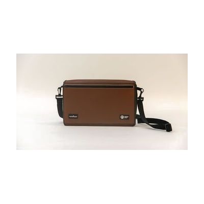 Front view of a closed turtleback case on a white background. The strap sits to the right of the device, and the brown cover has logos from HumanWare and APH