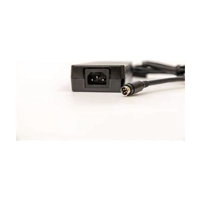 Close up of the black PageBlaster power supply showing the connector and input for the power cord.
