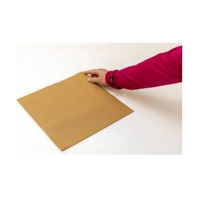 A woman wearing a magenta shirt with her index finger placed on one corner of the brown Swail Dot Inverter Rubber pad.
