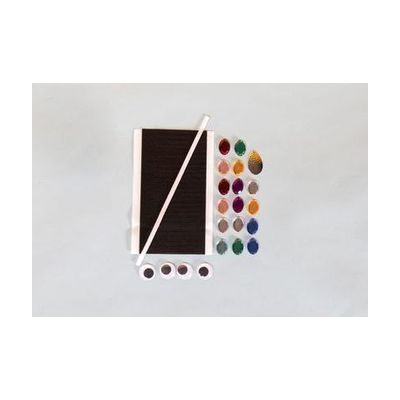 Picture Maker accent pieces laid out on a gray background including googly eyes and several colors of plastic gems.