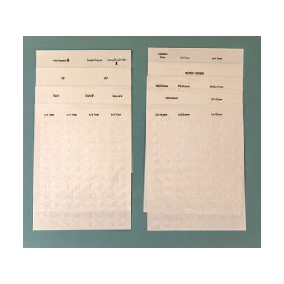 The additional symbols sticker sheets laid out on a teal background.