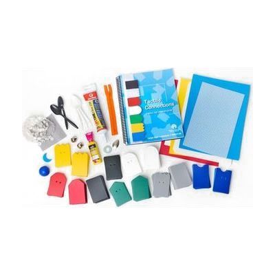 Assorted components included in APH’s Tactile Connections: Symbols for Communication including a variety of mounting cards in seven different colors and shapes, print guidebook, caulk tube, orange zipper, black and white spoons, fishing lure, steel washer, yellow puff ink, jingle bells, blue crescent shape, blue rubber ball, craft foam sheets (red, yellow, and blue), white needlepoint canvas, black plastic wire screen, adhesive-backed paper, vinyl sheets, and white hook coins/tabs.