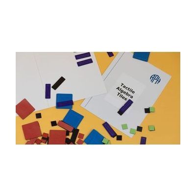 Tactile Algebra Tiles magnetic board with a variety of tiles scattered around, all on a yellow background.