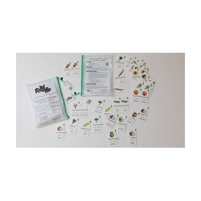 All the pieces from the Memory Puzzles: Fruits & Veggies kit spread out on a white background. The kit comes in two pouches with green zippers.