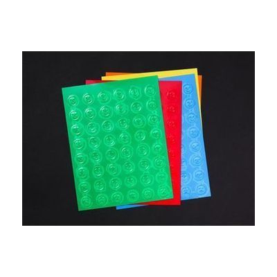 A stack of Smiley-Frowny Feel 'n Peel Sticker sheets in a variety of colors laid out on a black background.
