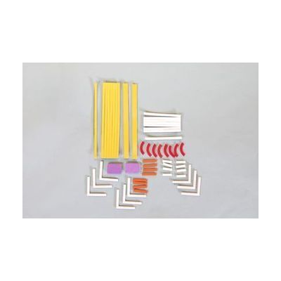 A variety of Picture Maker diagramming strips laid out on a gray background including long yellow strips, white strips in various shapes and lengths, curved red strips, orange strips, and two purple rectangles.