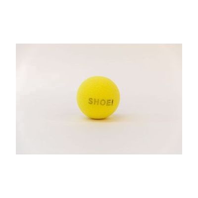 A yellow tennis ball with the word "SHOEI" printed in black