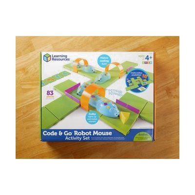 The Code and Go Mouse box on a table.