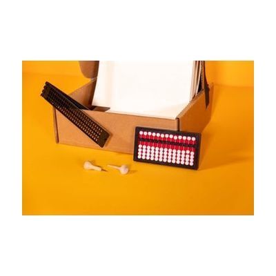 student starter pack box containing abacus, transcribing paper, and cell slate with saddle stylus