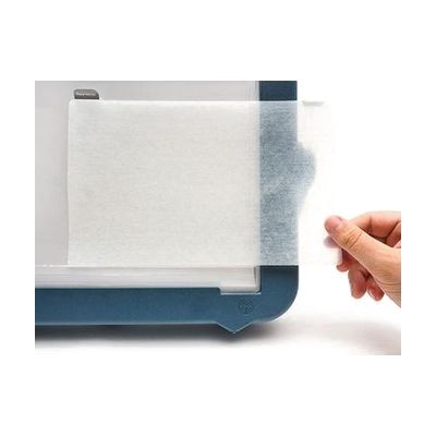 Hand placing Dycem on Mini Light Box