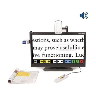 Large desktop video magnifier with 24-inch widescreen display on an adjustable arm, white and gray housing, with a flat docum