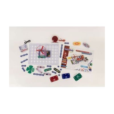 Each Snap Circuits Jr. 130 Access Kit part is displayed over a white background. An exercise is built on the breadboard showcasing the green power switch, one blue # 3 connector piece, a red fan, and two AA batteries inside a clear battery holder.