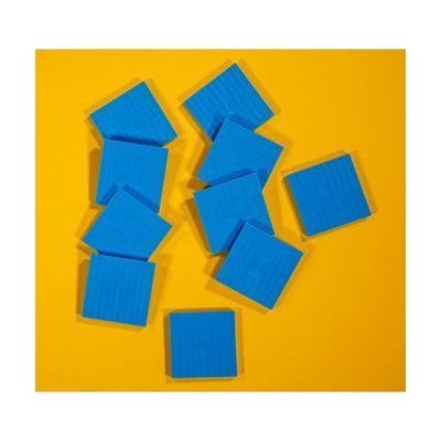 Flat square plastic tile with raised 10x10 grid pattern, approximately 5 by 5 inches