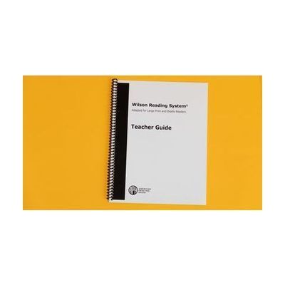 Large-print paperback or spiral-bound book with Wilson Reading System branding on the cover
