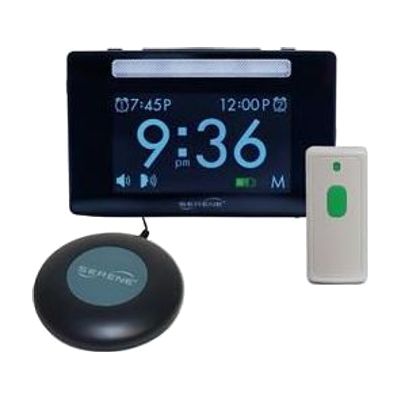White rectangular alarm clock display unit with a round bed shaker disc and a small white doorbell transmitter button