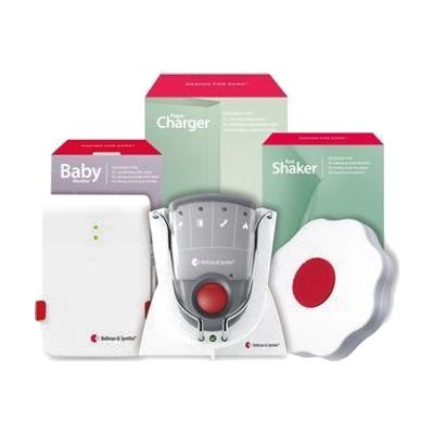 White baby monitor transmitter unit alongside a small rectangular pager receiver and a flat oval bed shaker pad, all in white