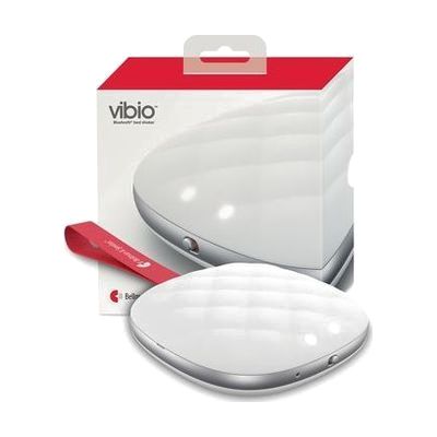 Small flat oval disc in white, roughly palm-sized, with a USB charging port on one edge