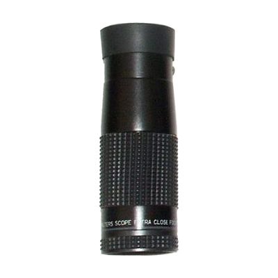 Small cylindrical monocular telescope in dark finish, approximately 3.75 inches long and 1.25 inches in diameter, with attach
