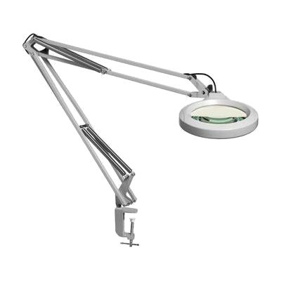 Light grey articulating magnifier lamp with large round 5-inch lens, long jointed arm, and desk clamp base