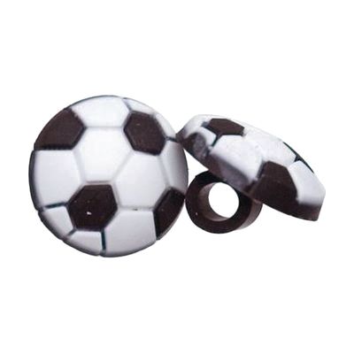 Small soft rubber charm shaped like a soccer ball with black and white panels, designed to clip onto hearing aid tubing