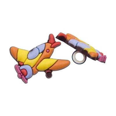 Small colorful rubber airplane-shaped charm designed to clip onto hearing aid tubing