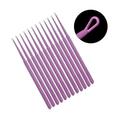 Pack of purple flexible single-use ear curettes with small looped plastic tips, approximately 3 inches long