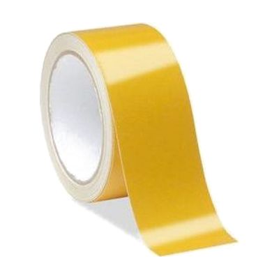 A roll of yellow reflective tape with a glossy surface and a white cardboard core, standing on end.